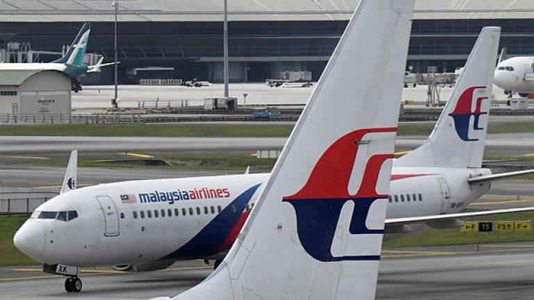 A MAS plane's tailwing.