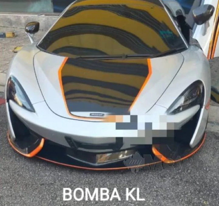 A 28-year-old man from Klang was found dead in the driver's seat of a McLaren sportscar. Image credit: Harian Metro