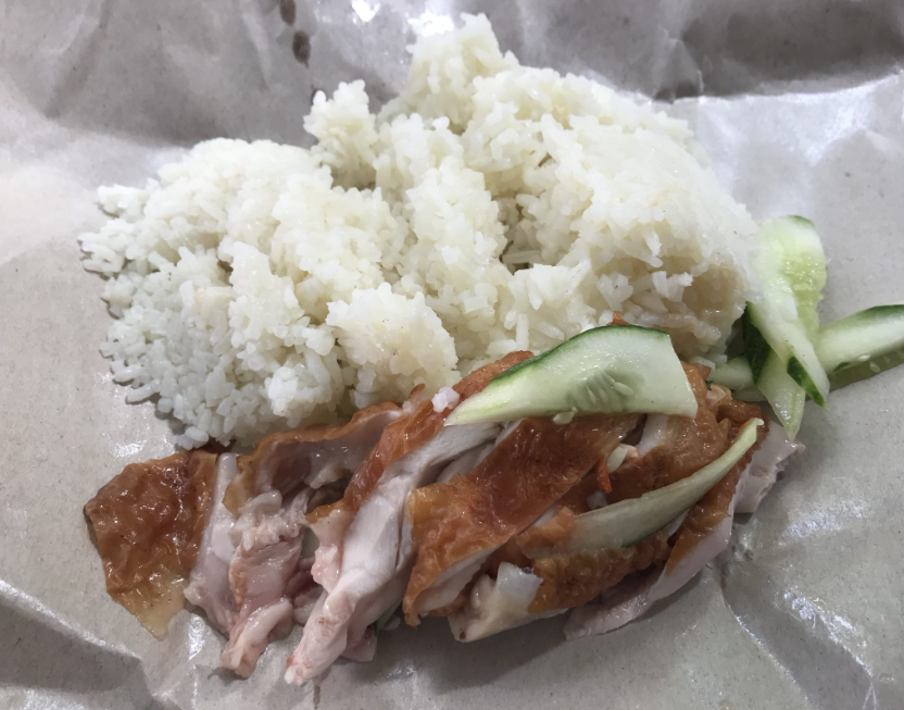 Chicken rice seller Chen Xian Kai has endeavoured to keep his prices low, so people can afford a meal. Image credit: Sin Chew Daily
