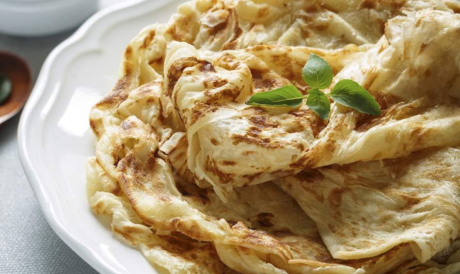 The publication points out that a number of different variations to the roti canai recipe are available. Image credit: TasteAtlas