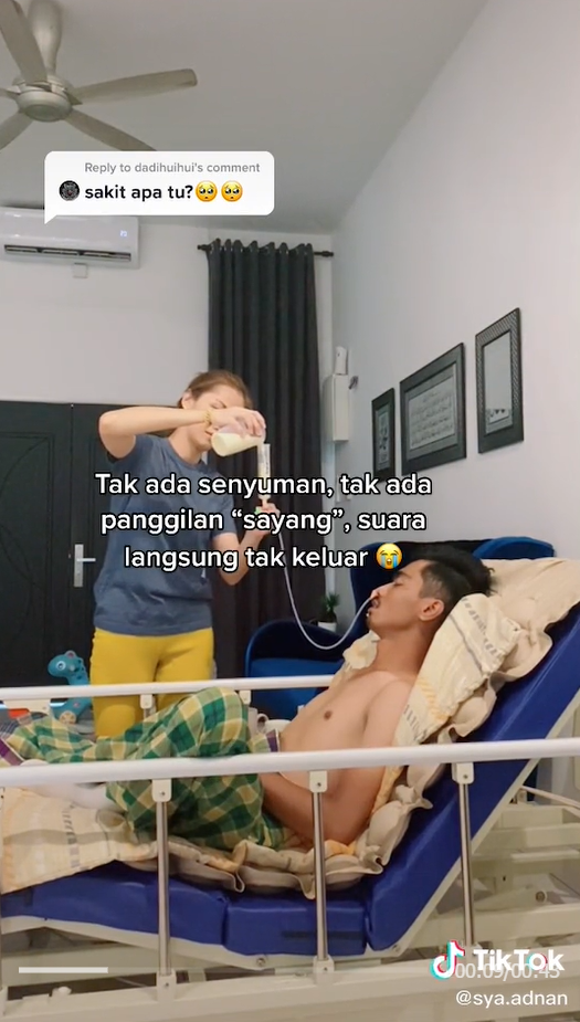 Syazwani feeding her husband using a nasogastric tube.