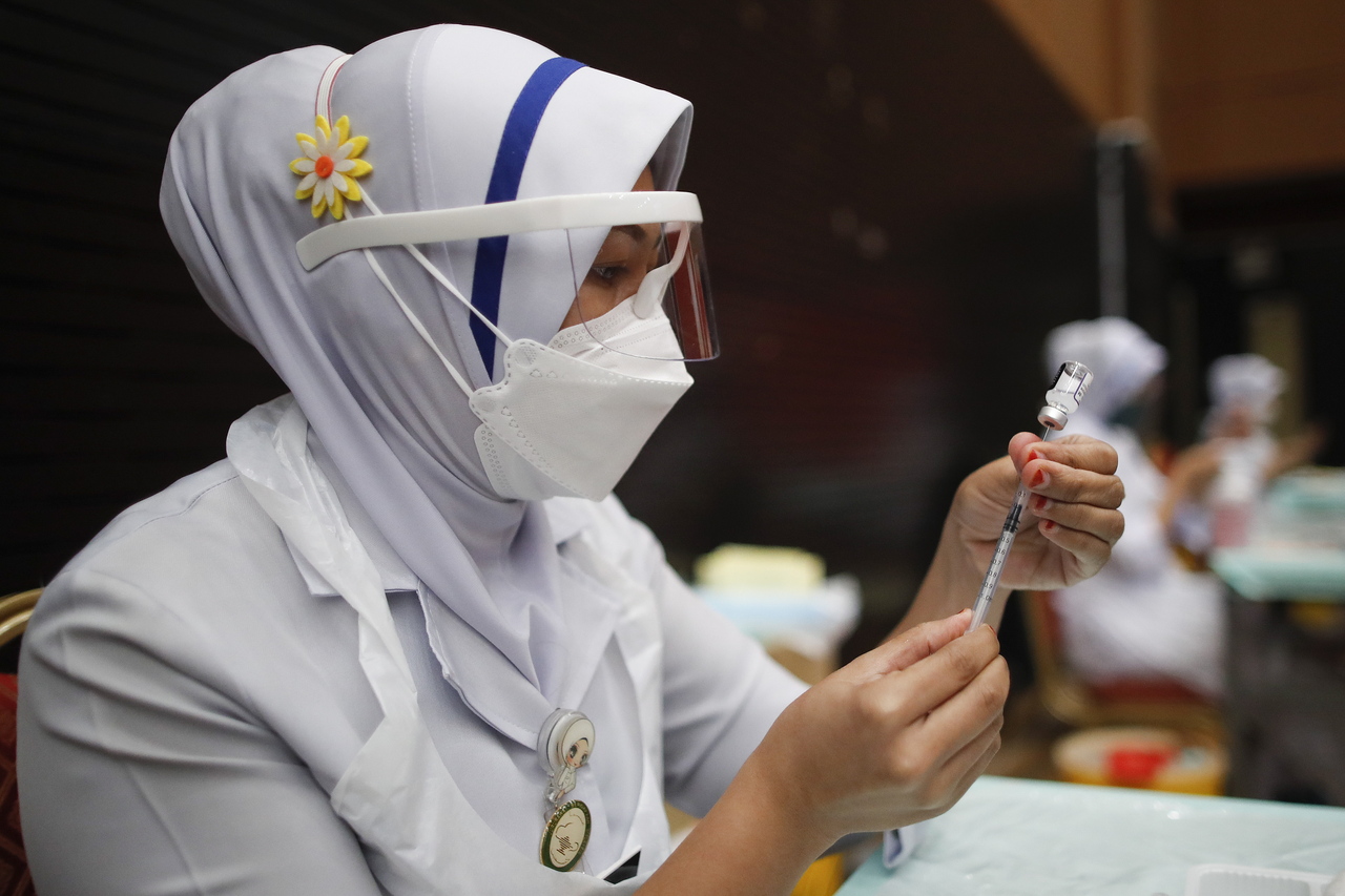 A Malaysian nurse at a vaccination centre. 