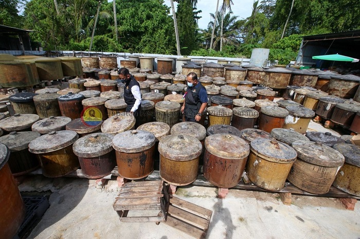 Authorities inspecting the soy sauce factory.