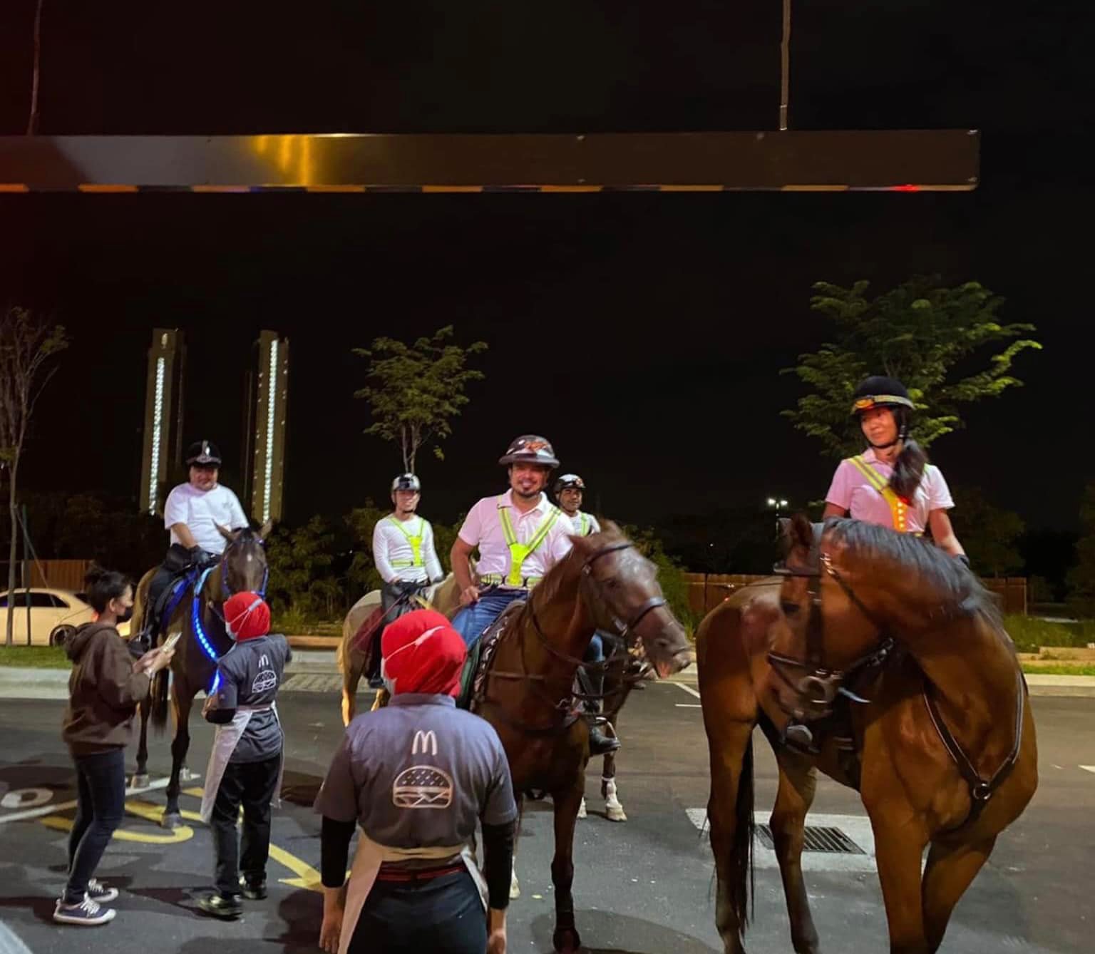 The group riding on horses.