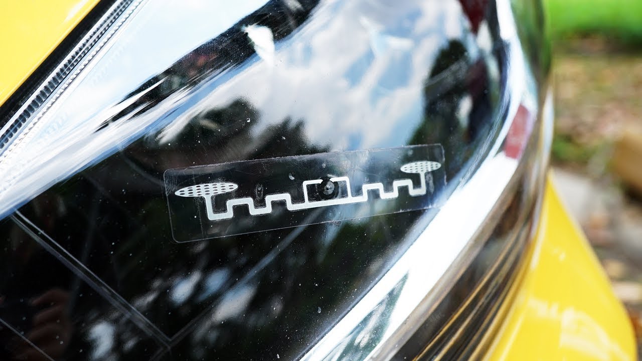 An RFID sticker on a car headlamp.