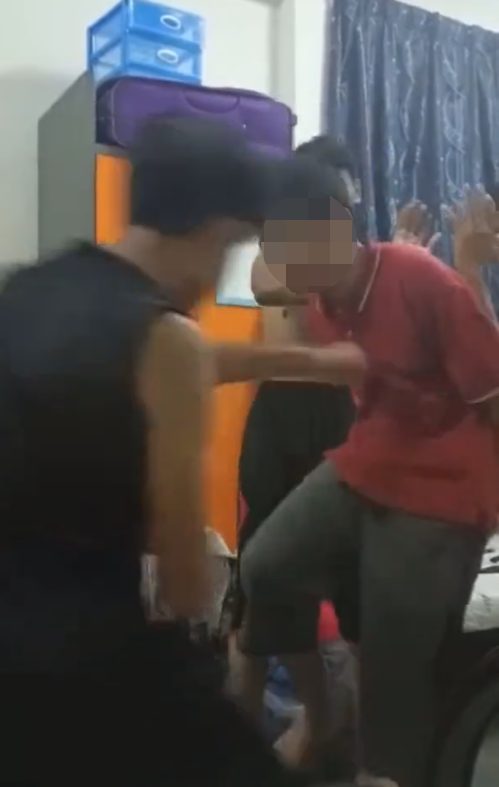 Bullies punching the young student.