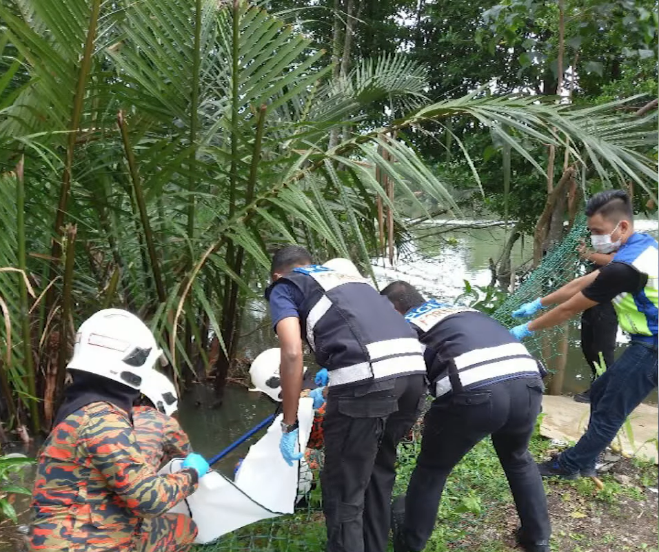 The body of the child being retrieved by authorities.