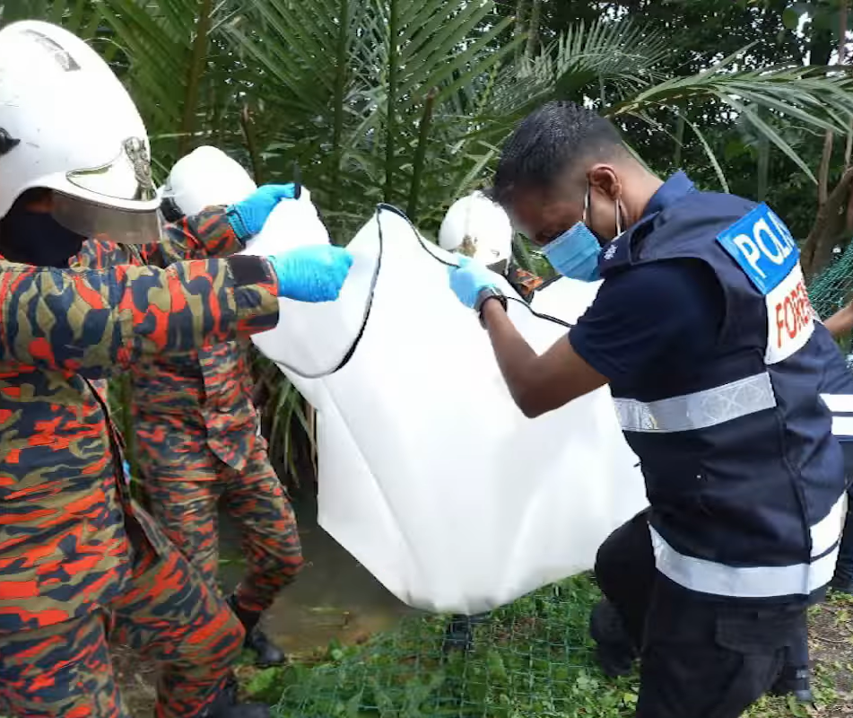 The body of the child being retrieved by authorities.