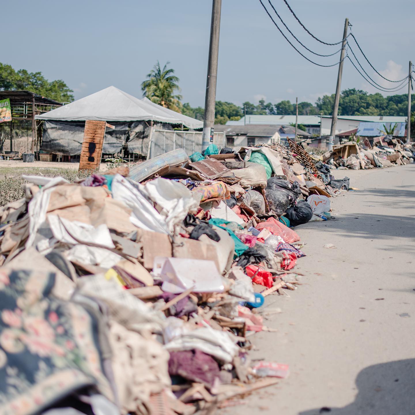 Volunteers helping to clean up the homes of flood victims.