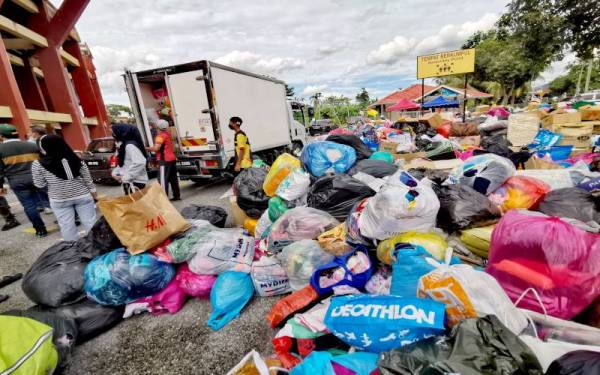 Donations received by the NGOs have filled a section of the stadium carpark.