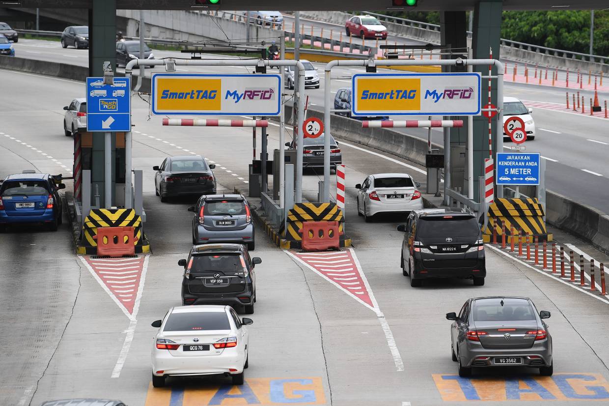 RFID and SmartTAG lanes at a local Malaysian highway.