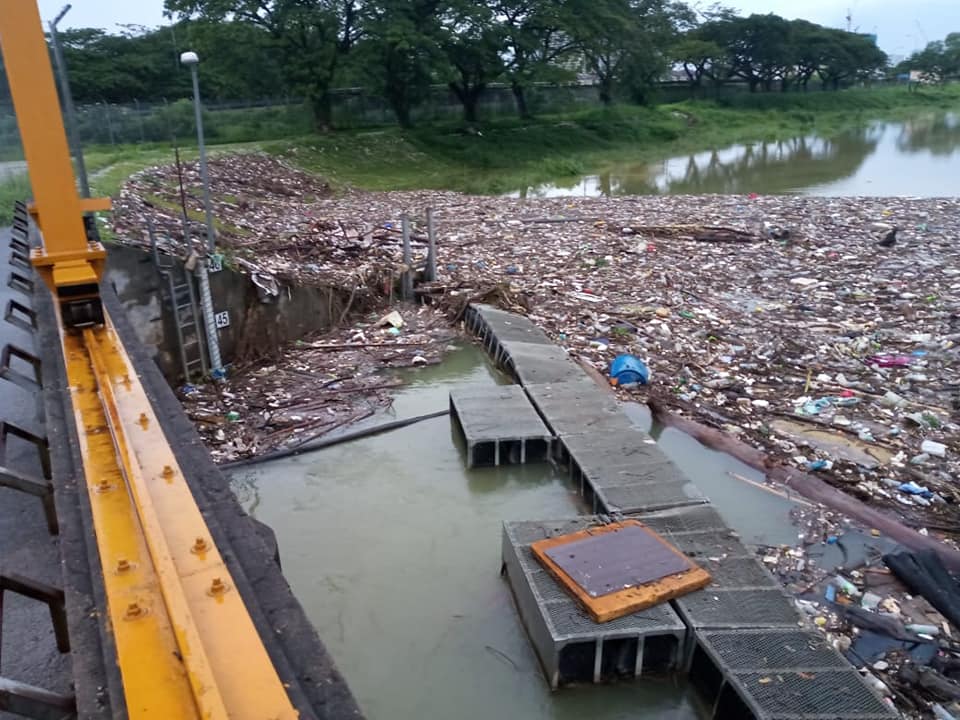 The state of drains and rivers in Kuala Lumpur, clogged with rubbish.