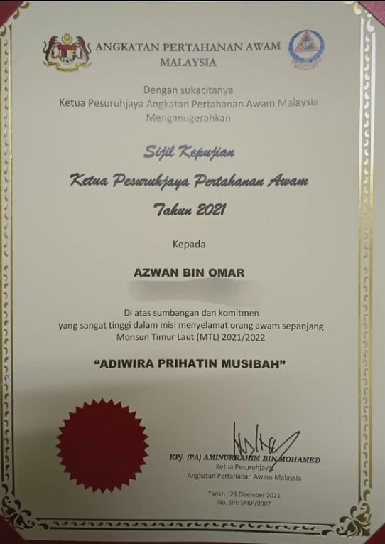 A photo of Abang Viva's award.