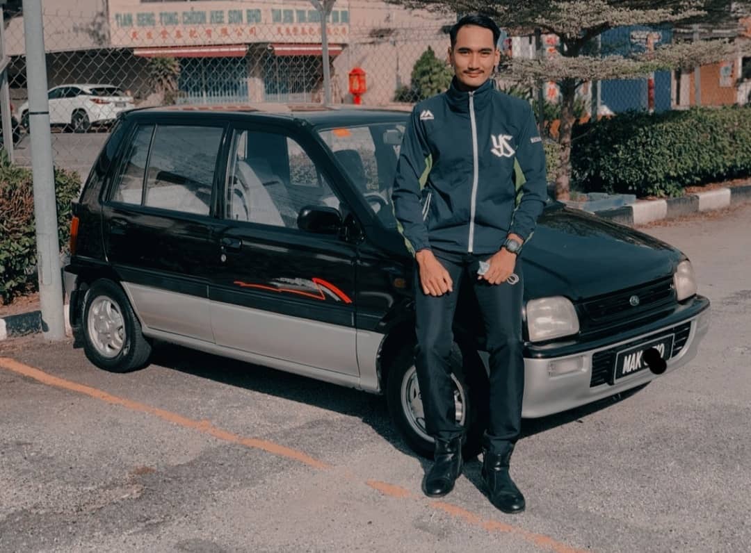 Mr Uwais with his Perodua Kancil, which he paid RM5,500 for.