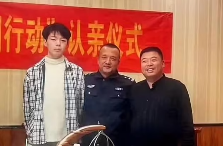 Liu reuniting with his biological parents.