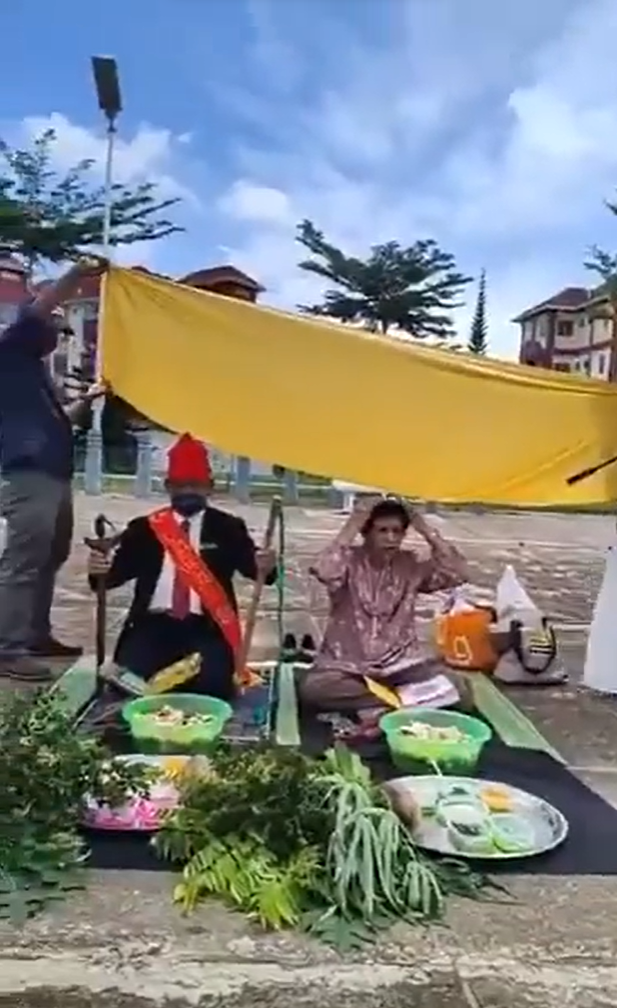 Raja Bomoh with Puteri Zaleha performing their ritual.