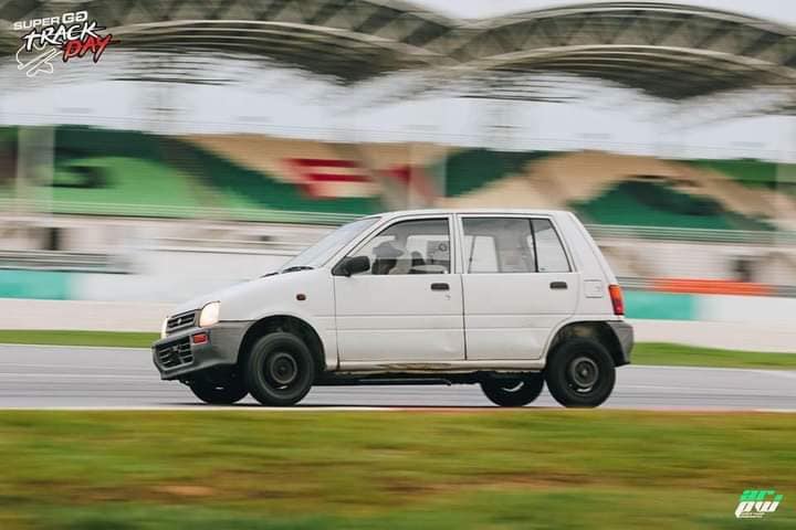 26-year-old Muhammad Iqbal racing his first-generation 4-speed Perodua Kancil on the track.