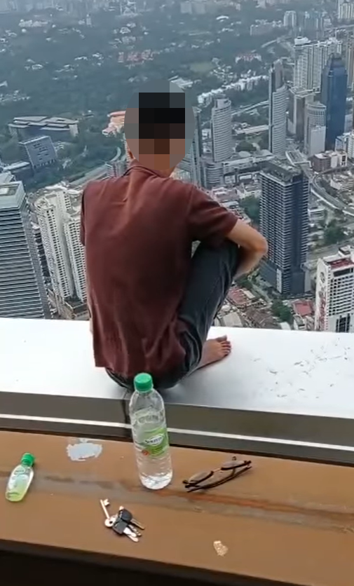 The young man that was successfully saved by firefighters from KL Tower's Sky Deck.