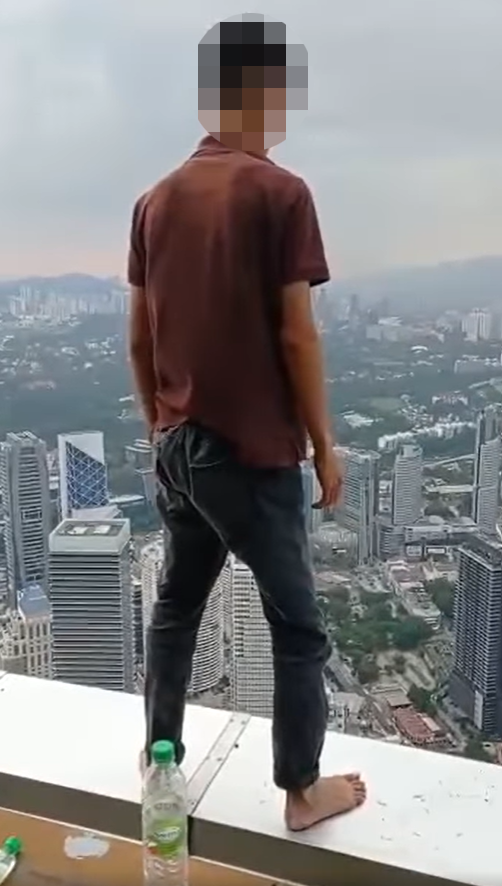 The young man that was successfully saved by firefighters from KL Tower's Sky Deck.