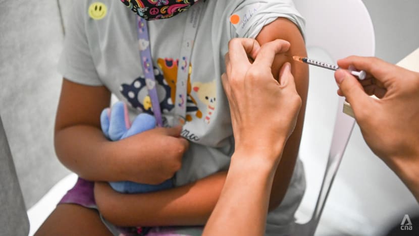A child receiving their vaccination.