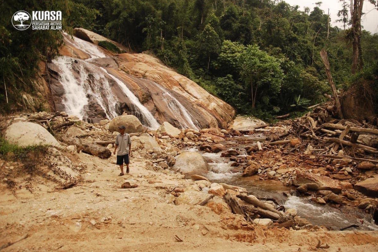 The waterfall in its current state is shallow and devoid of vegetation.