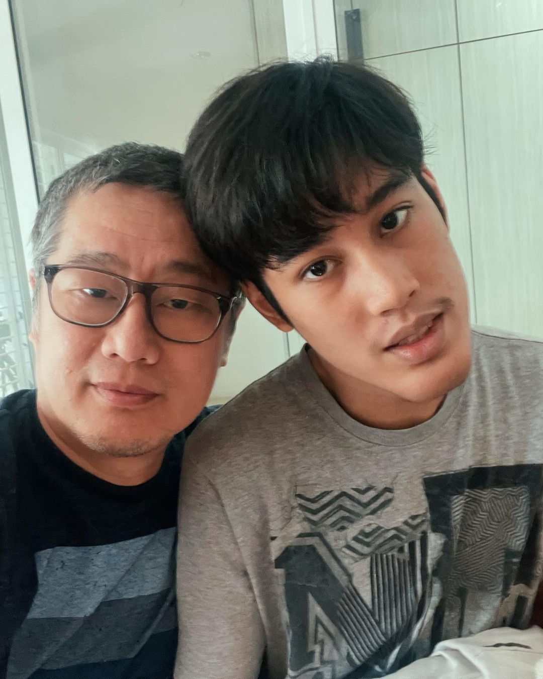 Iman with his 20-year-old autistic son, Adam