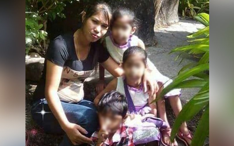 Loh with her three children. She has been granted full legal custody of them since March 2021. 