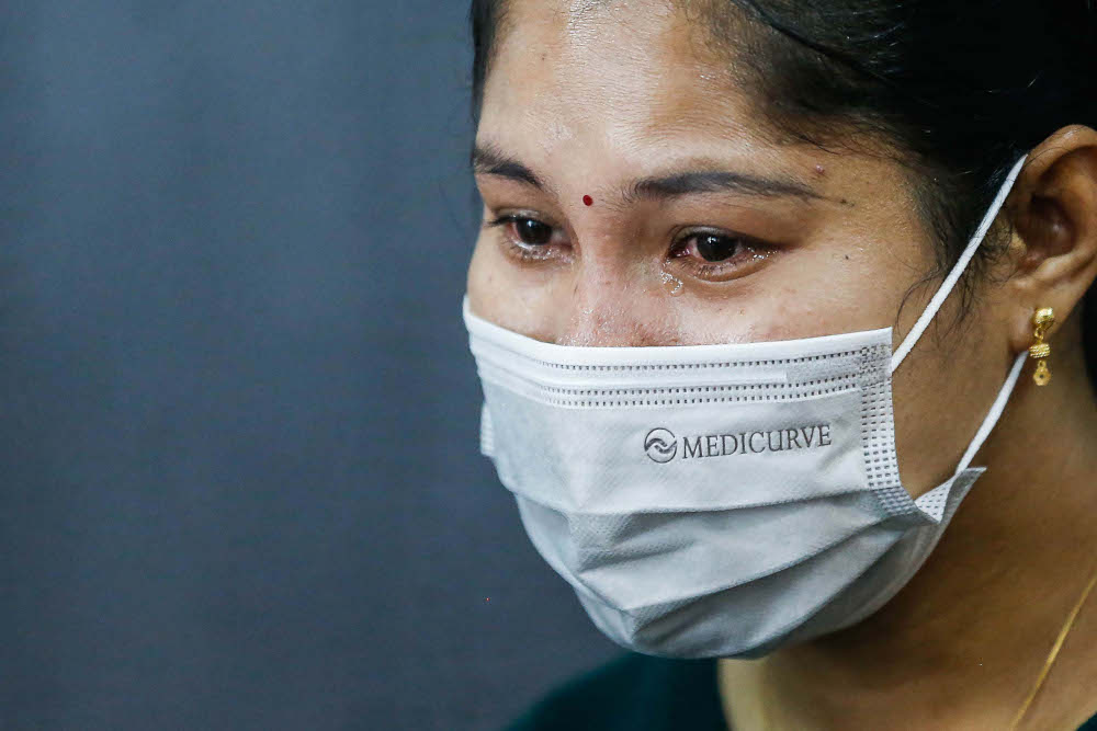 A tearful Loh Siew Hong seen during a press conference. 