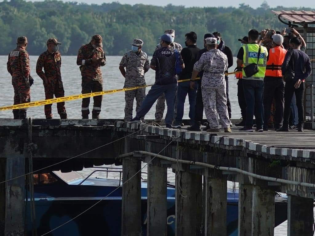 Authorities gathering at the pier while search operations remain underway yesterday (13th March 2022). Source: Traffik Info Crew