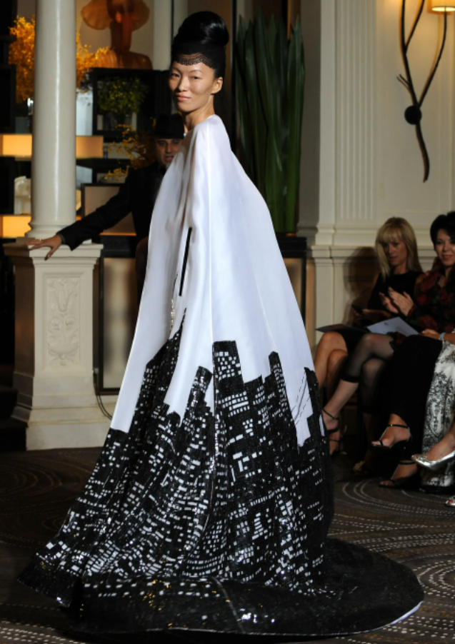 The Ralph Lauren design was allegedly copied from Malaysian designer Zang Toi, who also showcased a cape with crystal embellishments depicting the New York skyline in 2009. Image credit: New York Post
