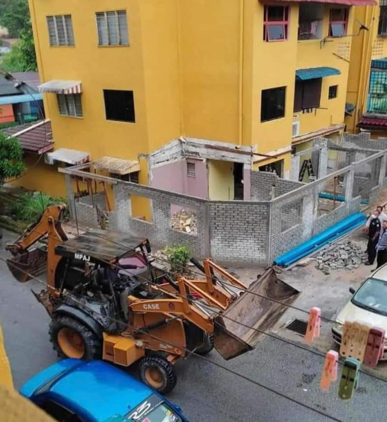 The MPAJ has gone viral after sharing a post of how they demolished an illegal home extension. Image credit: MPAJ