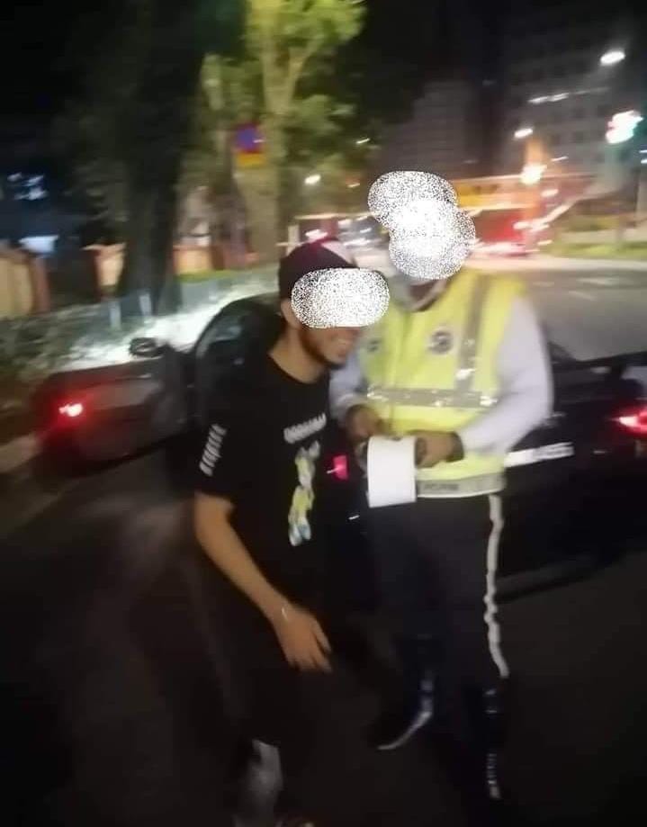 A well known 'mat rempit' influencer was fined by police for driving without a license. Image credit: PDRM