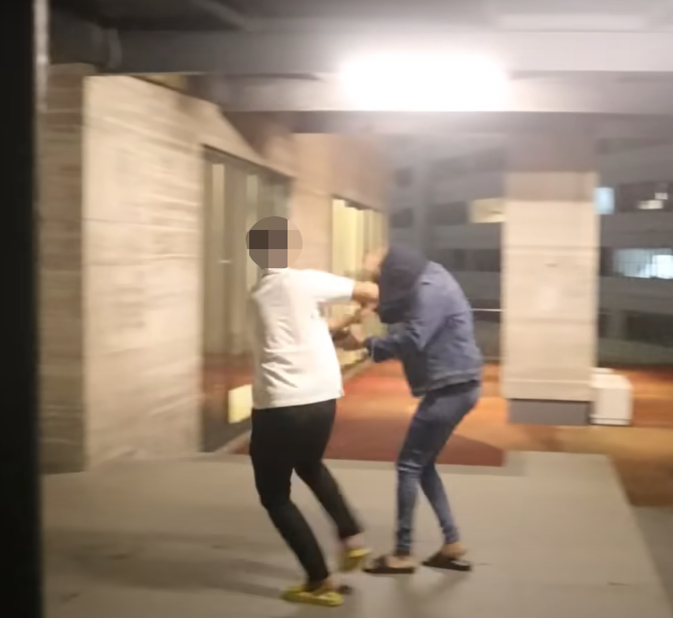 A YouTuber has been admonished by netizens for pranking unsuspecting women by tugging their tudungs over their faces. Image credit: YouTube