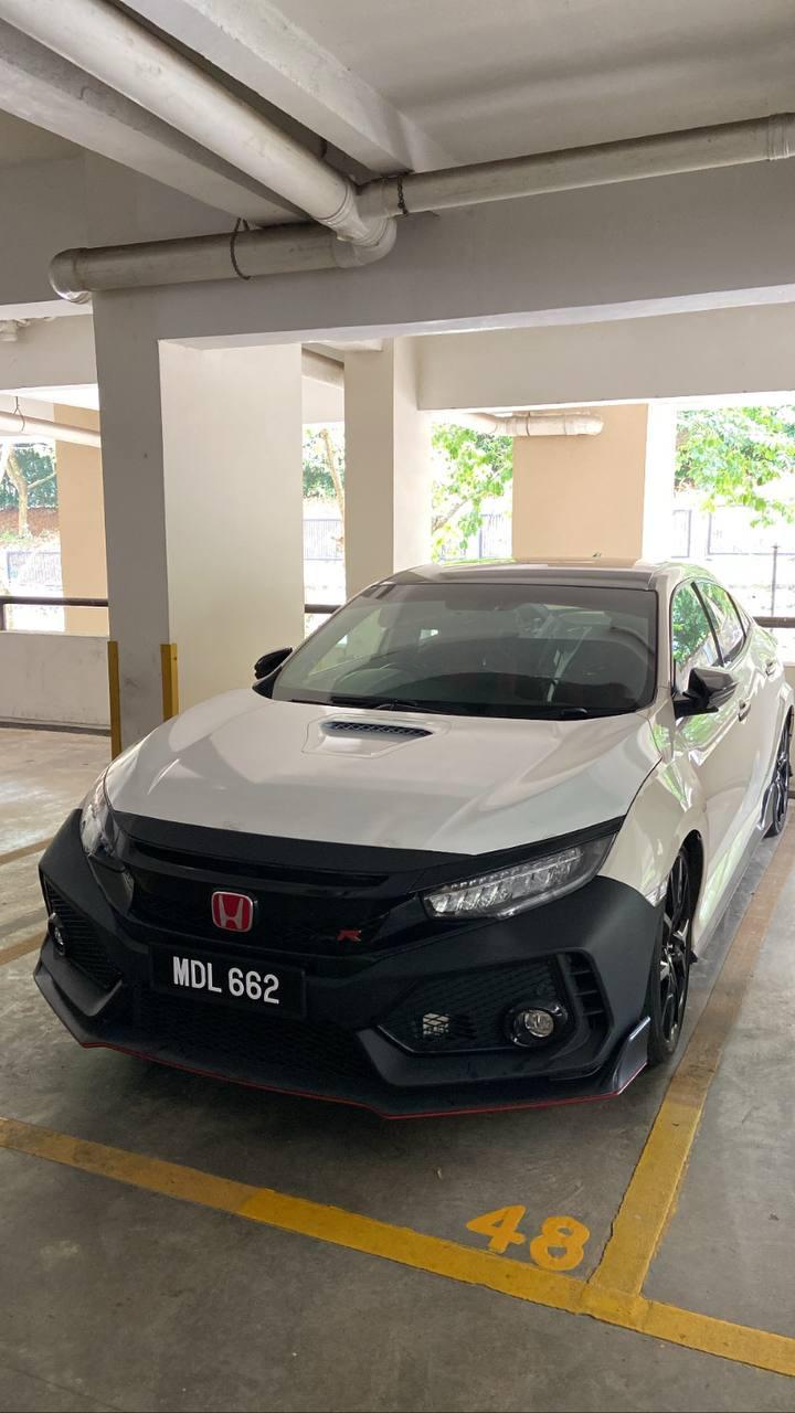 Damien's Honda Civic Type R has been recovered by local police. Image credit: China Press