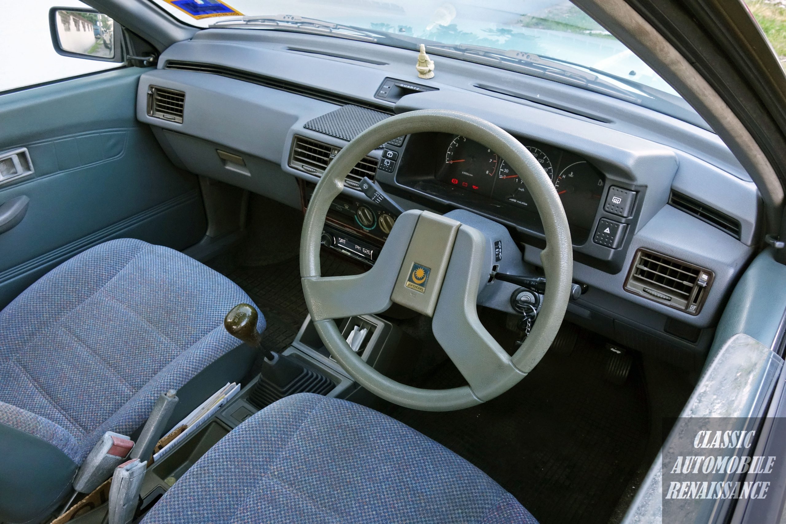The interior of Ken's Proton Saga. Image credit: Classic Automobile Renaissance