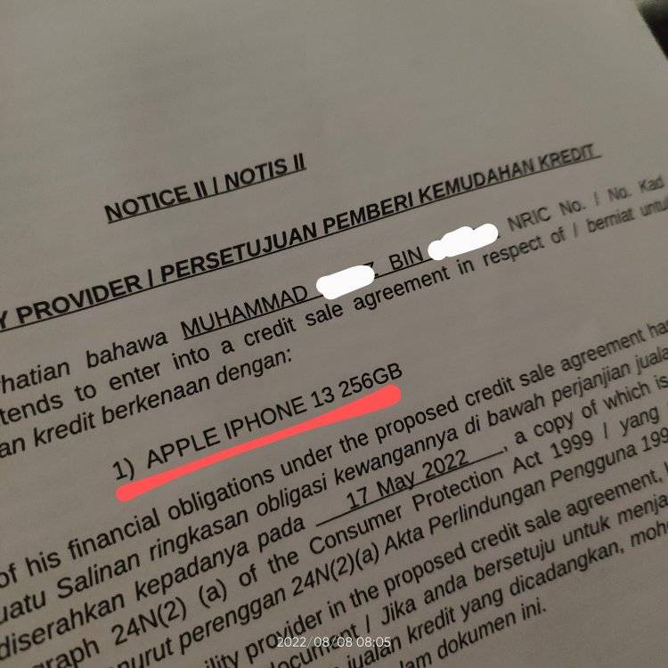 Amirul's tenant showed him a loan agreement he took up to purchase an iPhone 13 256GB. Image credit: Amirul Shafiq