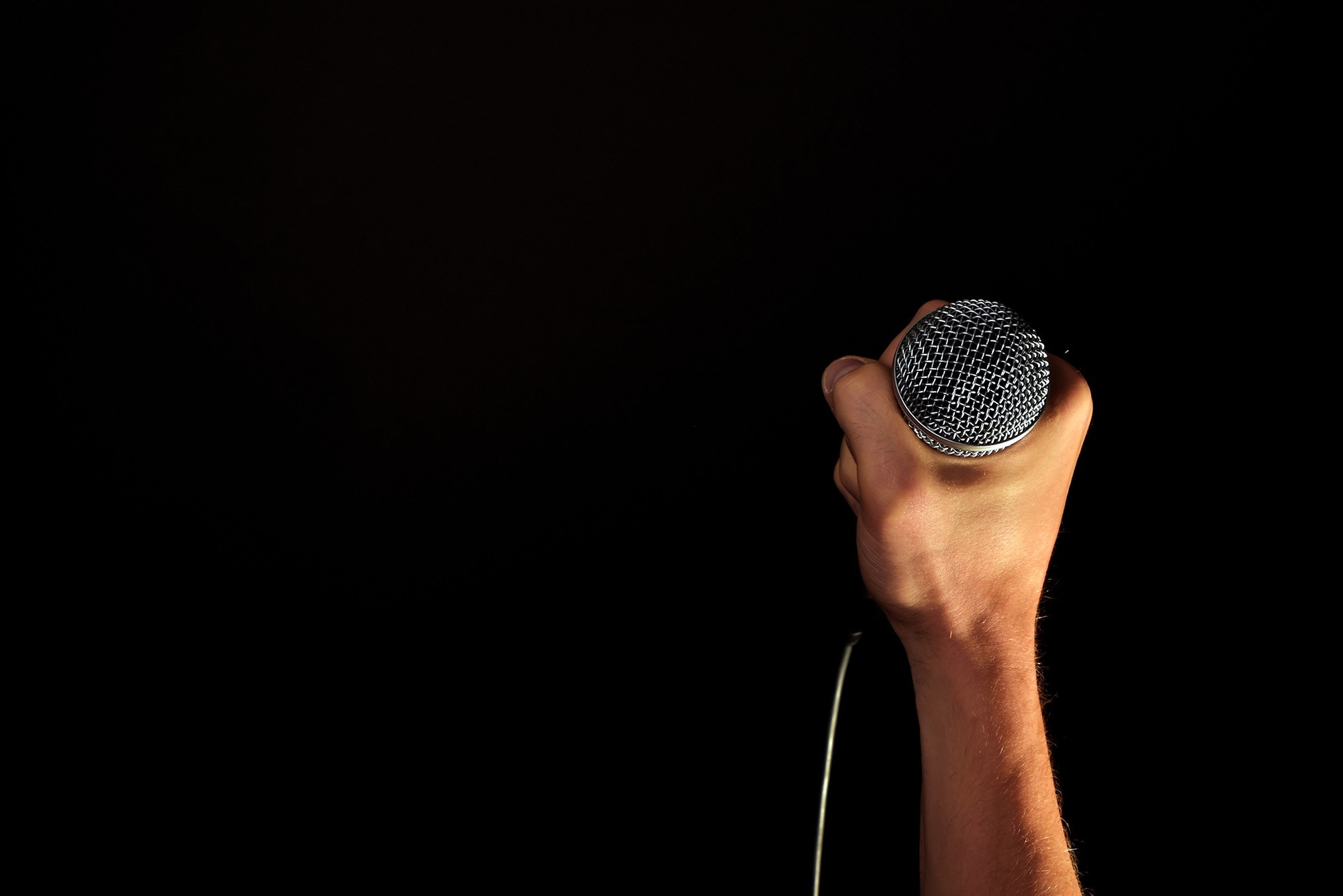 The man snatched the microphone from the religious preacher, before telling them to keep quiet. Image credit: Pixabay via Pexels