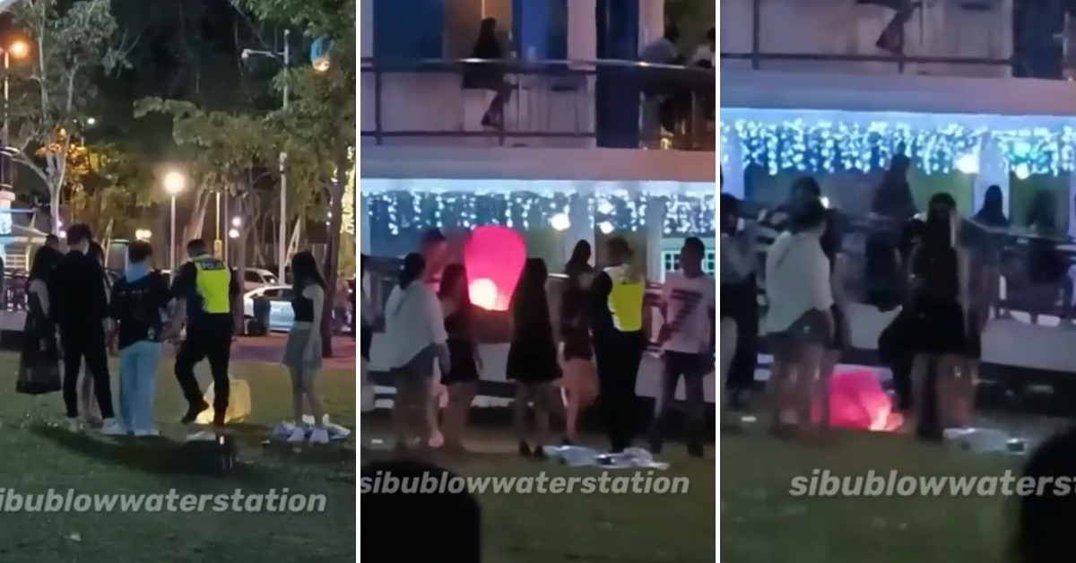 Policeman stomps out sky lanterns in Sibu during MidAutumn Festival to