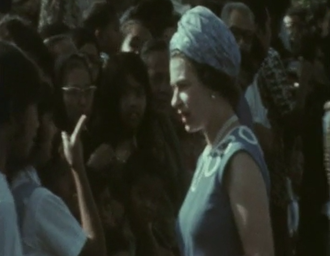 Queen Elizabeth II seen interacting with Malaysian schoolgirls during her 1972 visit. Image credit: Associated Press
