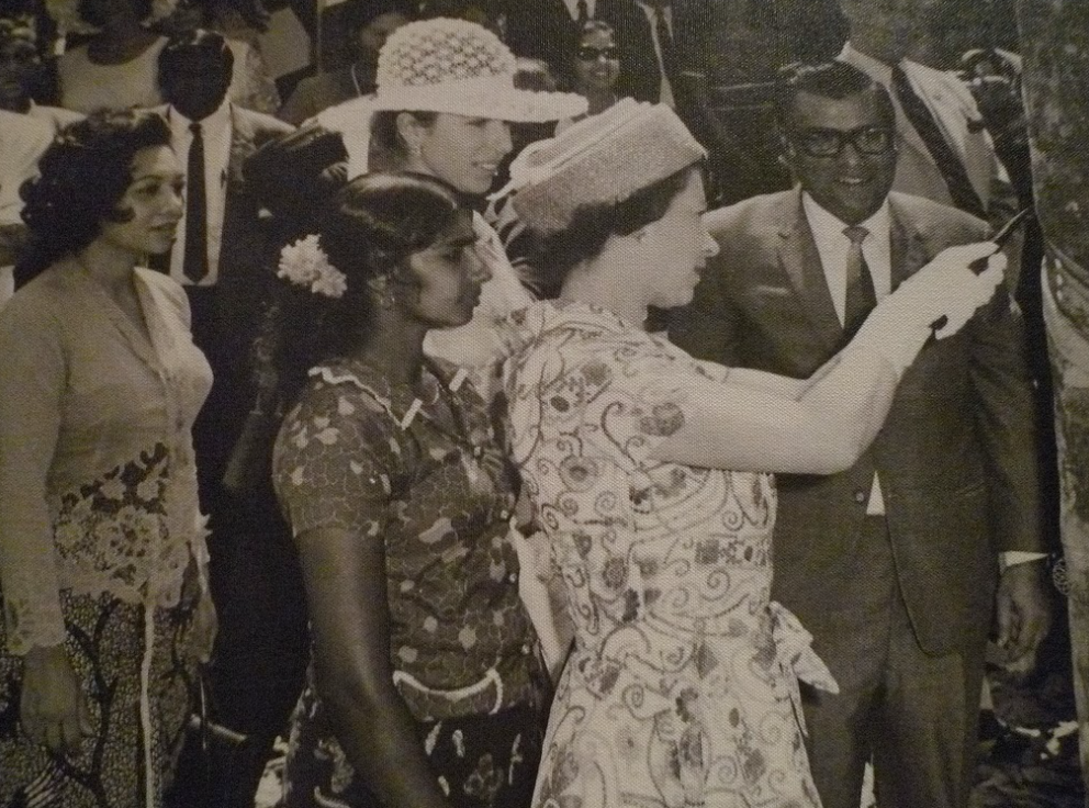 Her Majesty attempting to tap a rubber tree during a visit to Malaysia in 1972. Image credit: Warisan Permaisuri