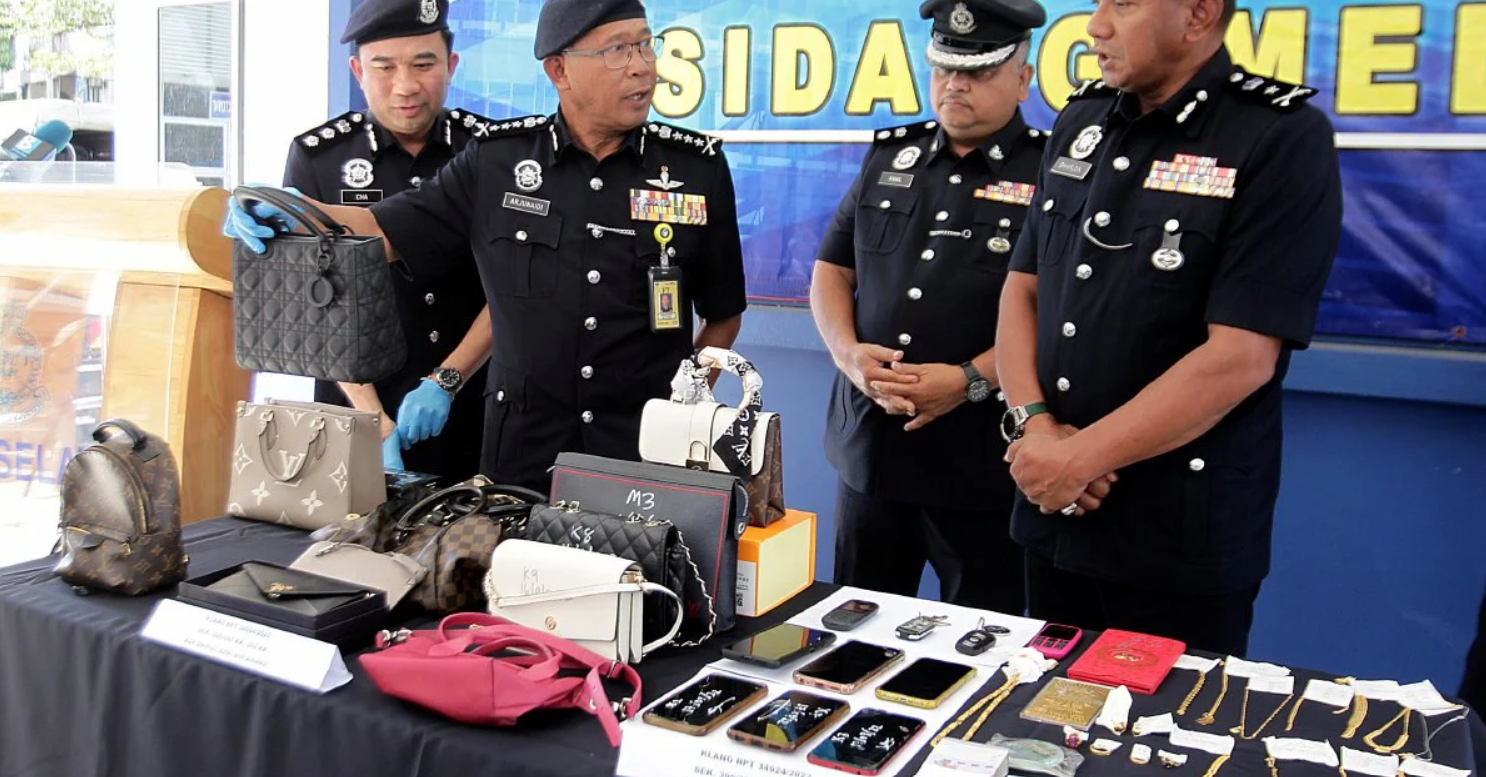 Items belonging to the couple that were said to have been stolen after the victim was murdered by hitmen. Image credit: Berita Harian