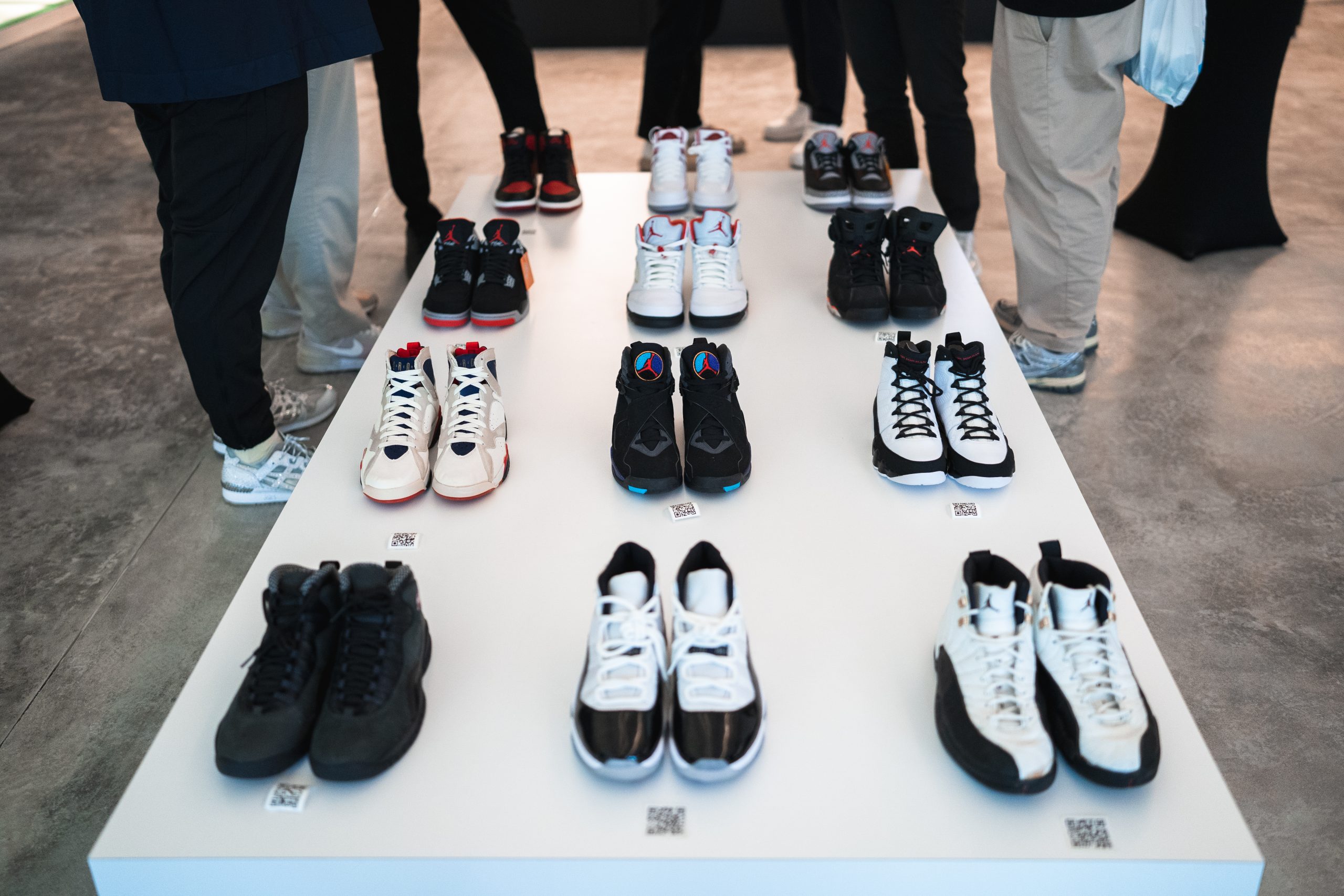Coveted sneaker editions laid out at the CNCRD showroom. Image credit: Provided to WauPost