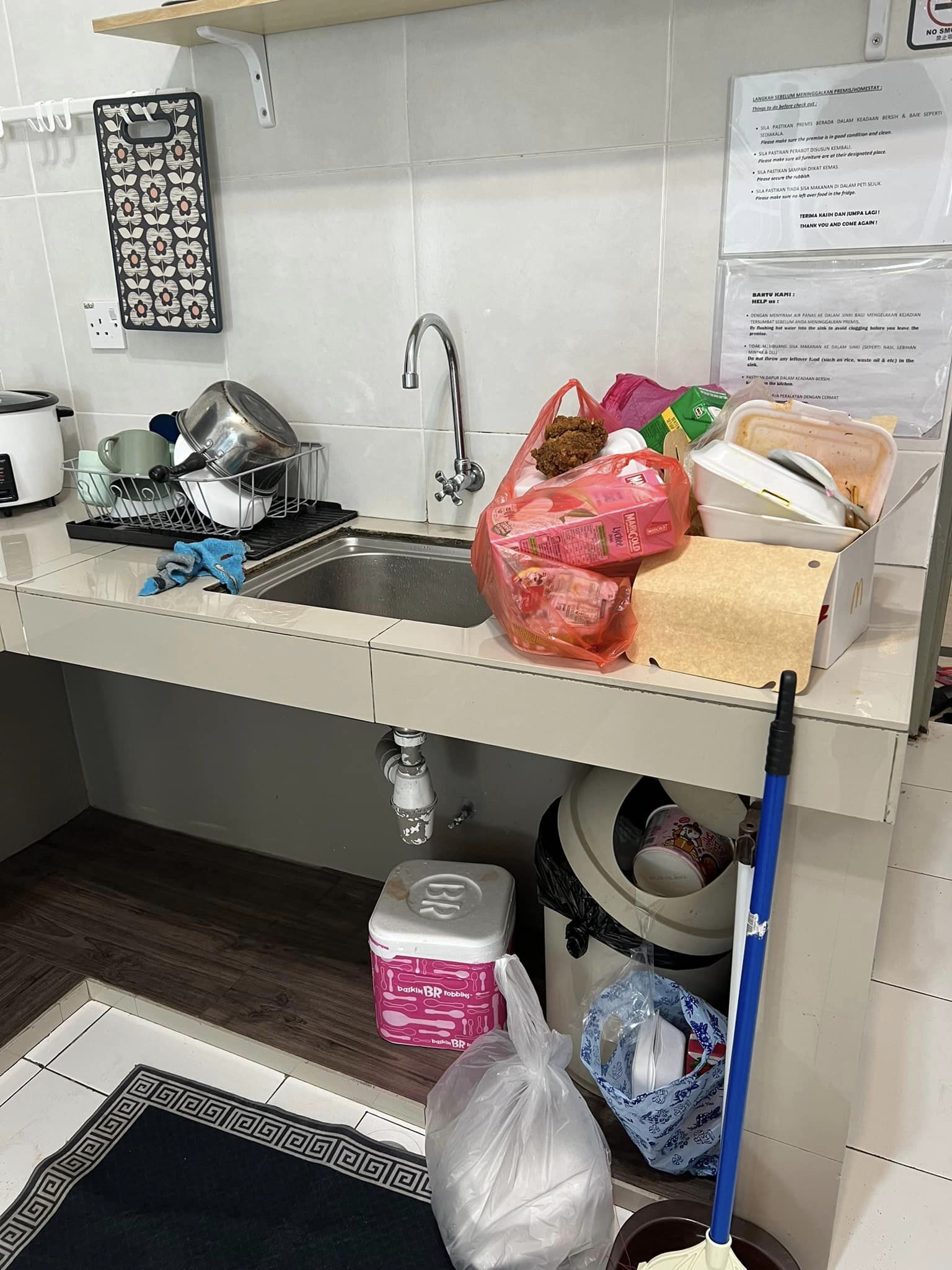 The tenants heaped rubbish onto the countertop of the kitchen in the homestay. Image credit: Nur Izzati Nadia
