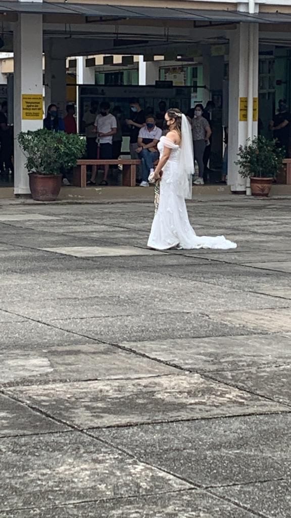 A bride dressed in her wedding gown was spotted at the SMK USJ 12 polling station today to cast her vote. Image credit: Michelle Ng Mei Sze 黄美诗