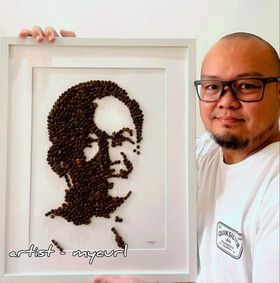 Local artist Mycurl Foo created a portrait of Anwar Ibrahim using only coffee beans. Image credit: Provided to WauPost