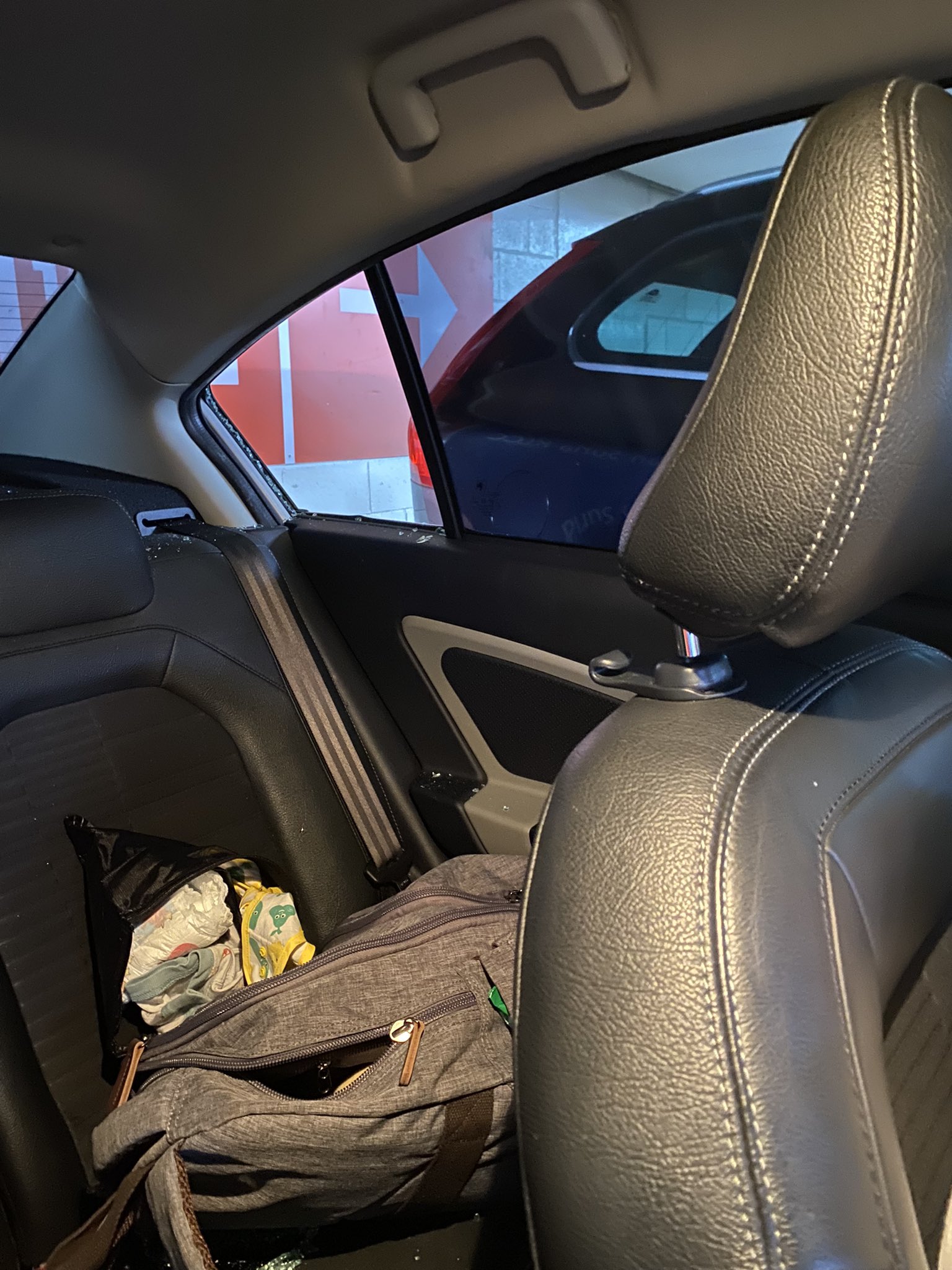 The thief had ransacked through his son's diaper bag, which was left in the backseat. Image credit: @irfannhaziq_