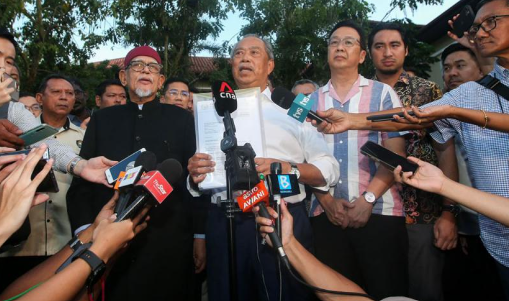 Perikatan Nasional leader Muhyiddin Yassin with PAS President Hadi Awang. Image credit: Malaysiakini