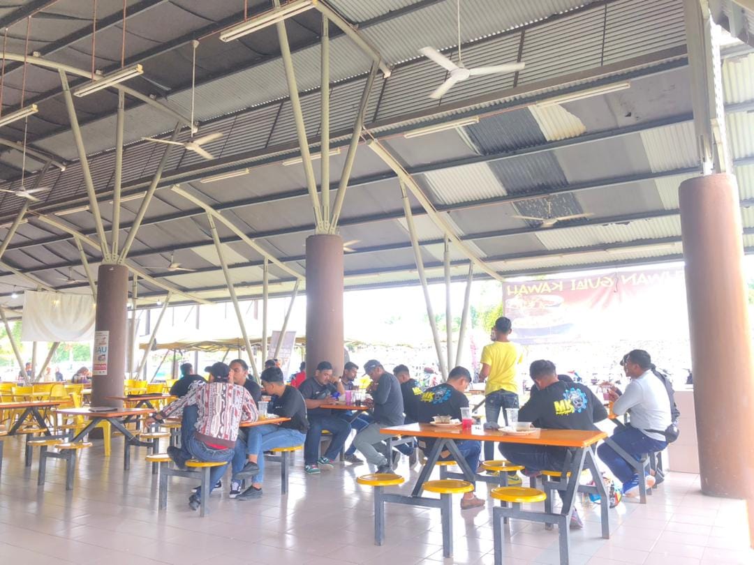 Members of a local motorbike owner's club decided to turn up at the stall to show the owner support. Image credit: Mehwan GULAI KAWAH