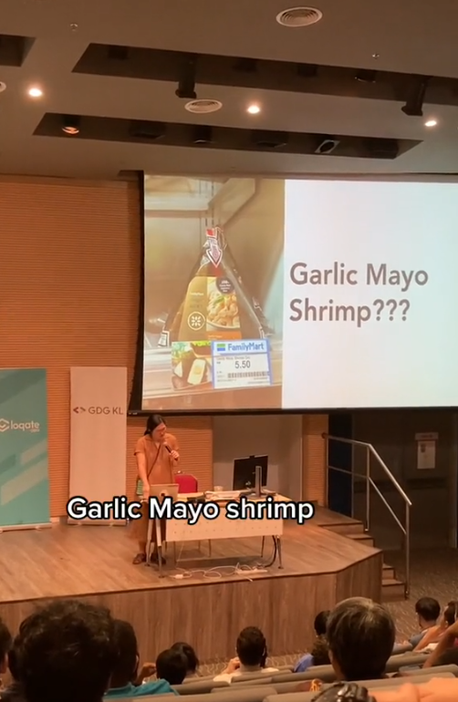 She was a little more hesitant over the Garlic Mayo Shrimp onigiri. Image credit: durianator